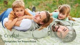  Presentation with campsite - Presentation theme featuring portrait-of-smiling-family-lying background and a soft green colored foreground