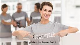  Presentation with volunteer - Theme having portrait of smiling female volunteer pointing on shirt in the office background and a soft green colored foreground