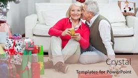  Presentation with kiss - Cool new PPT theme with portrait of smiling senior woman holding christmas present while man about to kiss her at home backdrop and a coral colored foreground