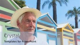  Presentation with colorful - PPT theme featuring portrait senior man at beach with colorful wooden huts background and a light blue colored foreground