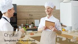  Presentation with intern - Colorful PPT theme enhanced with positive pleased handsome young chef with tattoo on arm making notes in sketchpad while testing intern cook at class backdrop and a coral colored foreground