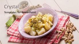  Presentation with nut - Audience pleasing presentation consisting of potatoes salad with capers leek and pistachio nut backdrop and a lemonade colored foreground
