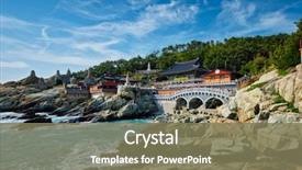  Presentation with korea - Amazing PPT theme having prayer - haedong yonggungsa temple on sea backdrop and a violet colored foreground