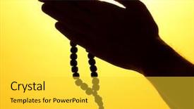  Presentation with prayer hands - Presentation theme enhanced with prayer bead - male hands with rosary background and a yellow colored foreground