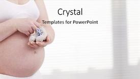  Presentation with baby shoes - Beautiful theme featuring pregant woman holding small baby backdrop and a sky blue colored foreground
