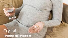  Presentation with pills - Amazing slides having pregnancy healthcare people and medicine concept - close up of pregnant woman with pills and water at home backdrop and a coral colored foreground