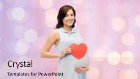 Presentation with heart love - Theme consisting of pregnancy love people and expectation concept - happy pregnant woman with red heart shape touching her belly over rose quartz and serenity holidays lights background background and a coral colored foreground