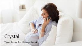  Presentation with motherhood - Amazing presentation theme having pregnancy motherhood technology people and expectation concept - happy pregnant woman calling on smartphone in bed at home backdrop and a light gray colored foreground