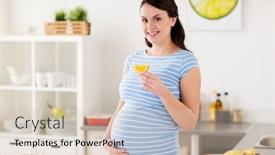  Presentation with orange slice - Slides having pregnancy people and healthy eating concept - happy pregnant woman with orange slice at home kitchen background and a soft green colored foreground