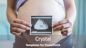  Presentation with ultrasound - Beautiful theme featuring pregnant woman holding an ultrasound in front of her belly backdrop and a gray colored foreground