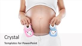  Presentation with baby girl - Audience pleasing theme consisting of pregnant woman holding baby booties backdrop and a white colored foreground