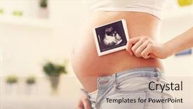  Presentation with pregnant woman - PPT theme with pregnant woman holding ultrasound scan background and a soft green colored foreground