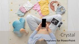  Presentation with black baby - PPT theme featuring pregnant-woman-using-phone-app background and a mint green colored foreground