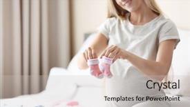  Presentation with baby clothes - PPT theme with pregnant woman with baby clothes at home background and a light gray colored foreground