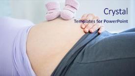  Presentation with baby shoes - Audience pleasing theme consisting of pregnant woman with baby shoes on belly at home backdrop and a sky blue colored foreground