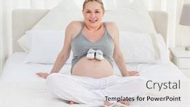  Presentation with baby shoes - Audience pleasing PPT theme consisting of pregnant woman with baby shoes on her belly at home backdrop and a light gray colored foreground