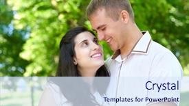  Presentation with summer trees - Slides consisting of pregnant woman with husband posing in the city park family portrait summer season green grass and trees background and a sky blue colored foreground