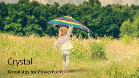  Presentation with kite - PPT theme having preschool rainbow - little cute girl flying background and a yellow colored foreground