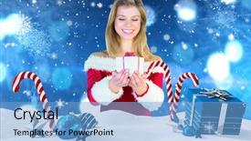  Presentation with christmas candy - PPT theme having pretty girl in santa outfit holding gift against christmas scene with gifts and candy canes background and a light blue colored foreground