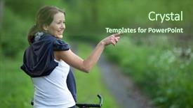 Presentation with mountain bike - Presentation theme featuring pretty young female biker outdoors on her mountain bike shallow dof selective focus background and a tawny brown colored foreground