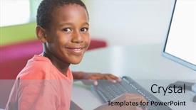  Presentation with computer lab science classroom - PPT theme enhanced with primary education - portrait of schoolboy using computer background and a light gray colored foreground
