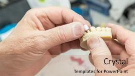  Presentation with dental implant - Presentation theme enhanced with printed mold for tooth implant background and a coral colored foreground