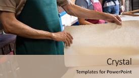  Presentation with worker - Audience pleasing theme consisting of printmaking - midsection of male worker checking backdrop and a soft green colored foreground