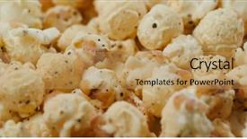  Presentation with popcorn kernel - PPT theme consisting of process food whole food - group of popcorn background and a coral colored foreground