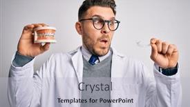  Presentation with orthodontics - Slides having professional-dentist-doctor-holding-denture background and a light blue colored foreground