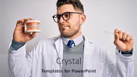  Presentation with orthodontics - Colorful PPT layouts enhanced with professional-dentist-doctor-holding-denture backdrop and a lemonade colored foreground