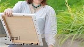  Presentation with canvas - Audience pleasing PPT theme consisting of professional-female-artist-painting backdrop and a mint green colored foreground
