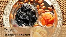  Presentation with grape - Amazing slide set having prunes and other dried fruits in glass with grape leaves saucers closeup backdrop and a coral colored foreground