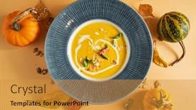  Presentation with pumpkin seeds - Slide set enhanced with pumpkin cream soup with herbs and seeds background and a gold colored foreground