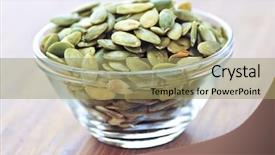  Presentation with pumpkin seeds - Beautiful PPT theme featuring pumpkin seeds close up in glass bowl backdrop and a mint green colored foreground