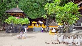  Presentation with pura - Presentation consisting of pura-goa-lawah-bali-indonesia background and a soft green colored foreground