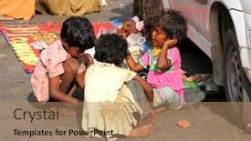  Presentation with rajasthan - PPT theme consisting of pushkar-india-november-20-poor background and a coral colored foreground