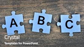  Presentation with puzzle pieces - Theme having puzzle pieces with letters abc background and a  colored foreground