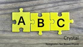  Presentation with abc - Cool new presentation theme with puzzle pieces with word abc backdrop and a mint green colored foreground