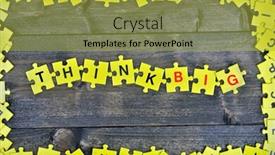  Presentation with puzzle pieces flying in - Presentation theme featuring puzzle pieces with words think big background and a gold colored foreground