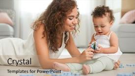  Presentation with baby smile - Amazing PPT theme having puzzle smile - cute baby and young mother backdrop and a coral colored foreground