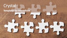  Presentation with closeup of foosball table soccer - Amazing slide deck having puzzles on wooden table closeup backdrop and a  colored foreground