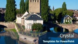  Presentation with france - Audience pleasing PPT theme consisting of quai-des-ponts-couverts backdrop and a ocean colored foreground