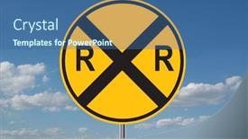  Presentation with railroad - Audience pleasing presentation theme consisting of railroad crossing warning with clouds backdrop and a ocean colored foreground
