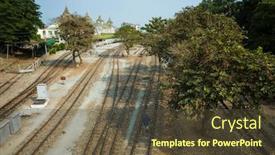  Presentation with railway tracks - Slides enhanced with railway-tracks-near-yangon-central background and a tawny brown colored foreground