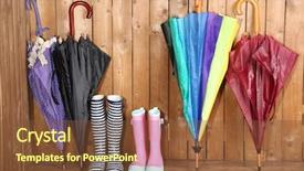  Presentation with wooden cross against the sky - Slides featuring rain boots - bright umbrellas leaning background and a tawny brown colored foreground