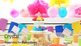  Presentation with children birthday - Colorful slide deck enhanced with rainbow cake - prepared birthday table with sweets backdrop and a yellow colored foreground
