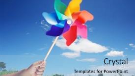  Presentation with wheel - Slide deck enhanced with rainbow garden - hand holding pin wheel background and a light blue colored foreground