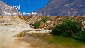  Presentation with ravine - PPT theme having ravine-ein-avdat-is-formed background and a teal colored foreground