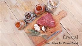  Presentation with aged wood - Cool new theme with raw beef meat fillet with peppercorn and thyme and different spices in glass bottles ready to grill on wood figured aged board over table backdrop and a coral colored foreground