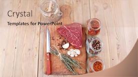  Presentation with aged wood - Theme having raw beef meat fillet with peppercorn and thyme and different spices in glass bottles ready to grill on wood figured aged board over table background and a coral colored foreground